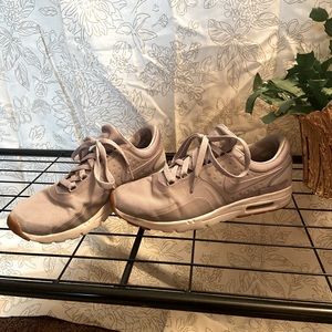 Lavender worn twice Nike tennis shoes.